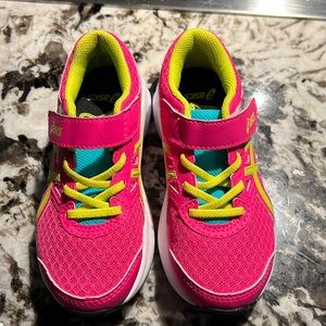 NBW ASICS girls sneaker. Pink, yellow and teal. Velcro closure.